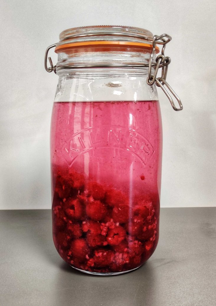 Raspberry flavoured gin in a Kilner jar