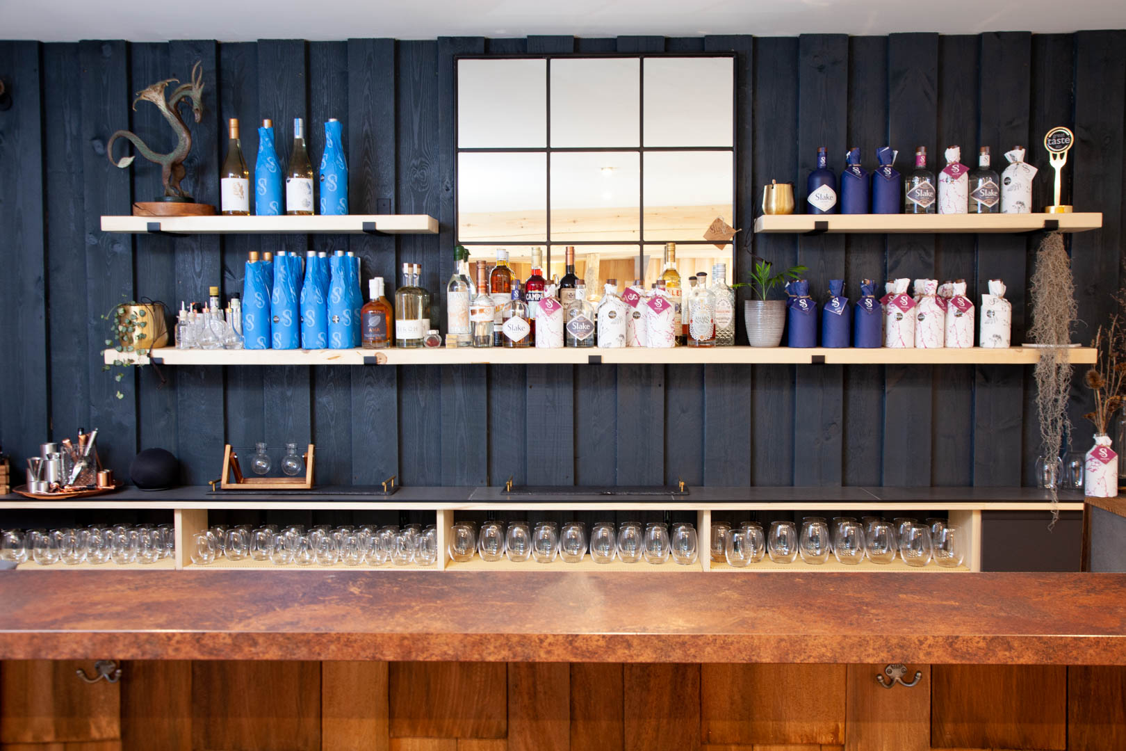 Photo of the bar at The Knuckerhole tasting room at Slake Spirits - The Chalk House